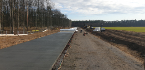 Produkcja betonu nawierzchniowego (beton drogowy) na 33 Bazę Lotnictwa Transportowego w Powidzu - Xbeton Polska Produkcja betonu nawierzchniowego (beton drogowy) na 33 Bazę Lotnictwa Transportowego w Powidzu - Xbeton Polska